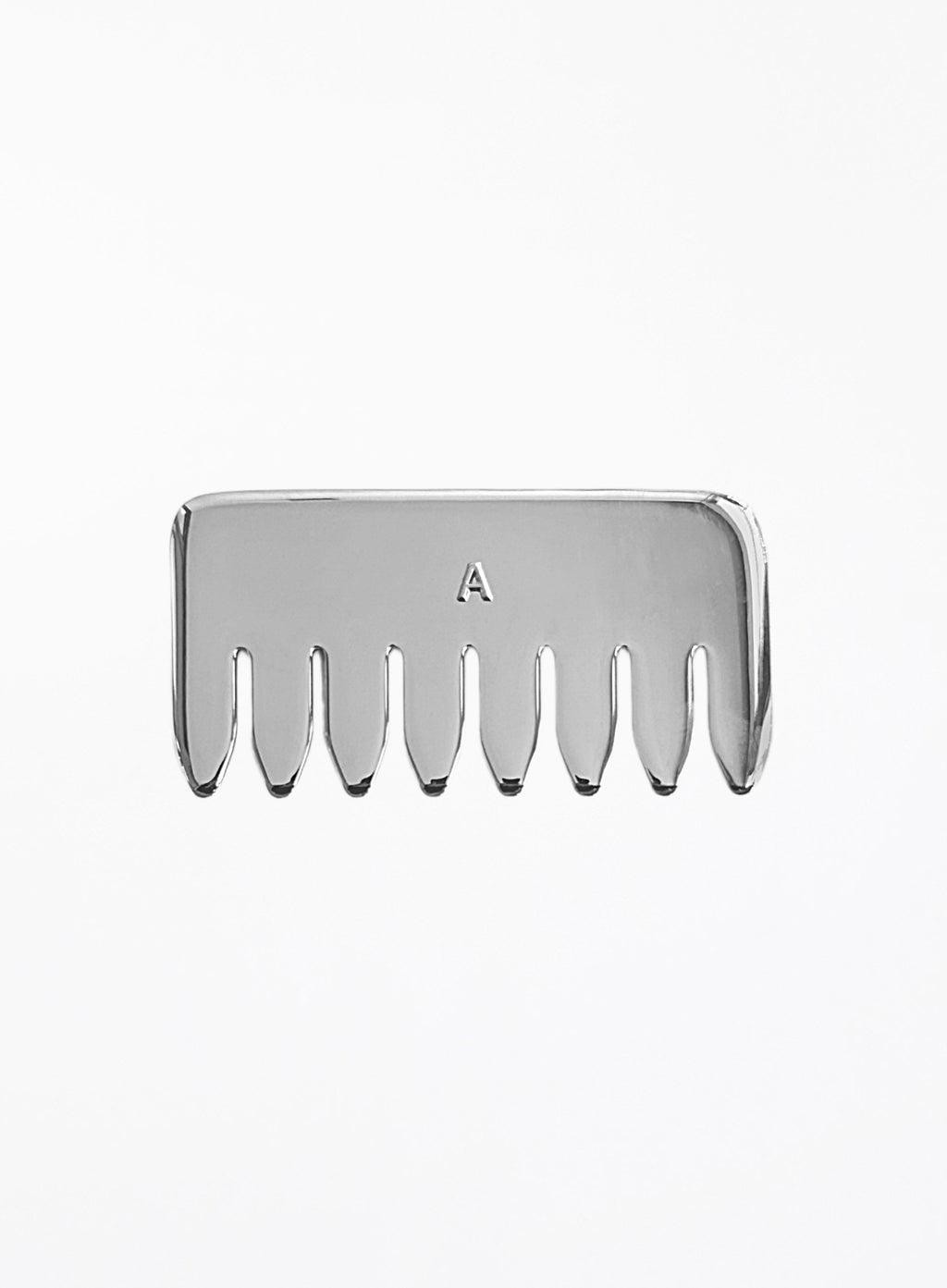 A silver metal hair-tooth comb with a small engraved letter 'A' in the center, shown against a plain white background.