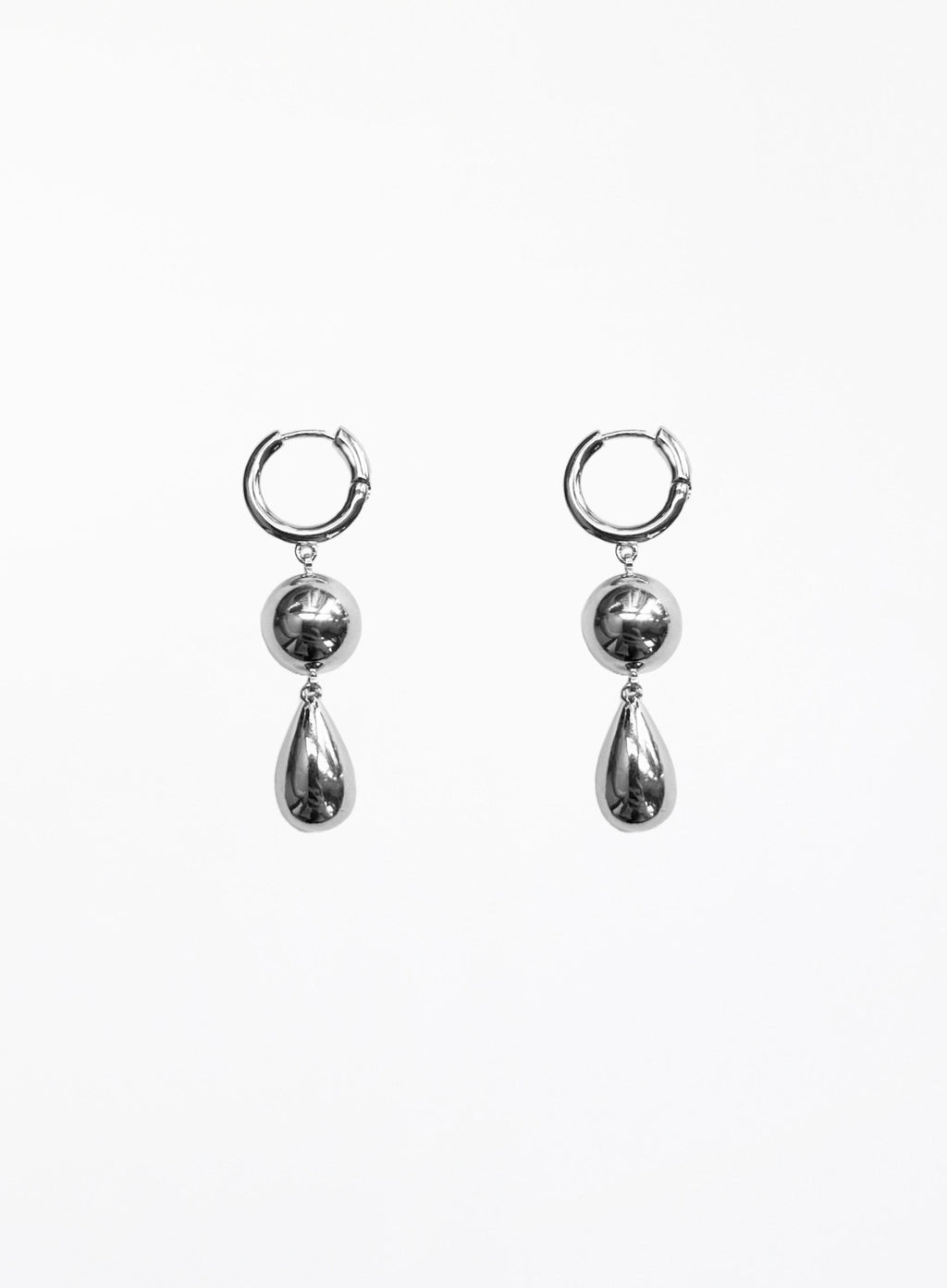 Pair of silver hoop earrings with teardrop-shaped charms on a white background