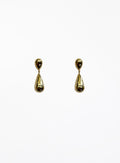Pair of gold teardrop earrings on a white background