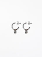 Pair of silver hoop earrings on a white background
