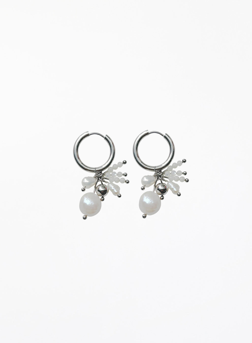 A pair of silver hoop earrings with dangling pearl clusters and small silver beads, shown on a plain white background.