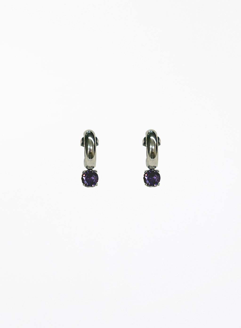 Pair of silver hoop earrings with purple gemstones on a white background