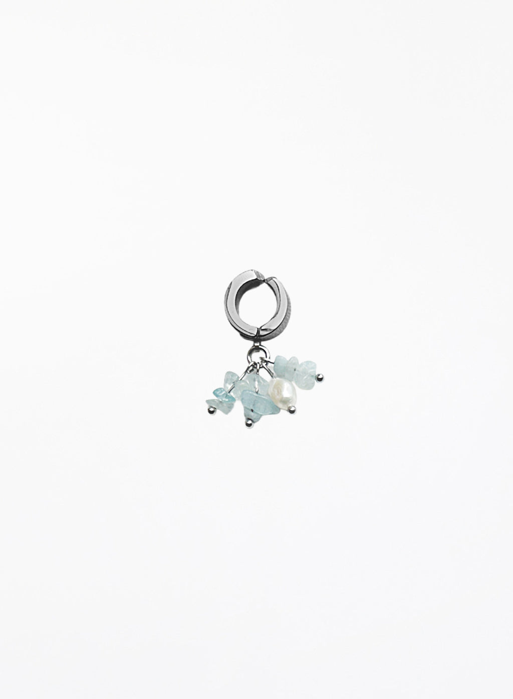 aquamarine and pearl earcuff on a white background