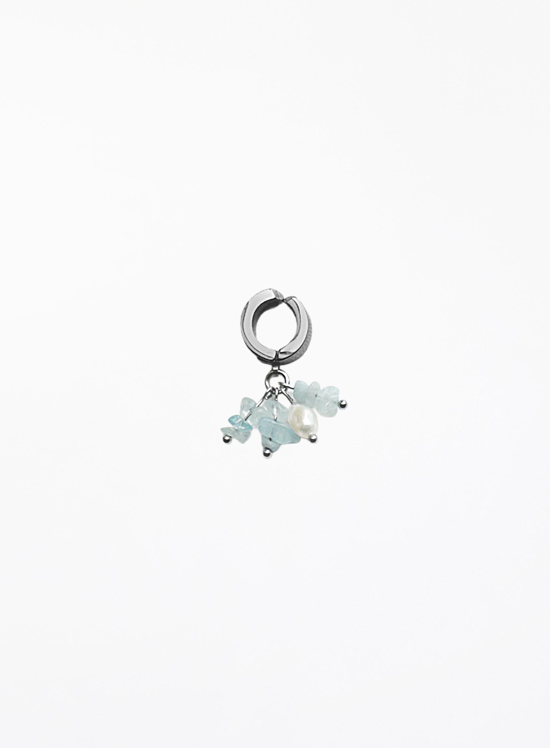 aquamarine and pearl earcuff on a white background