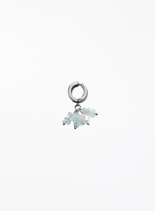 aquamarine and pearl earcuff on a white background