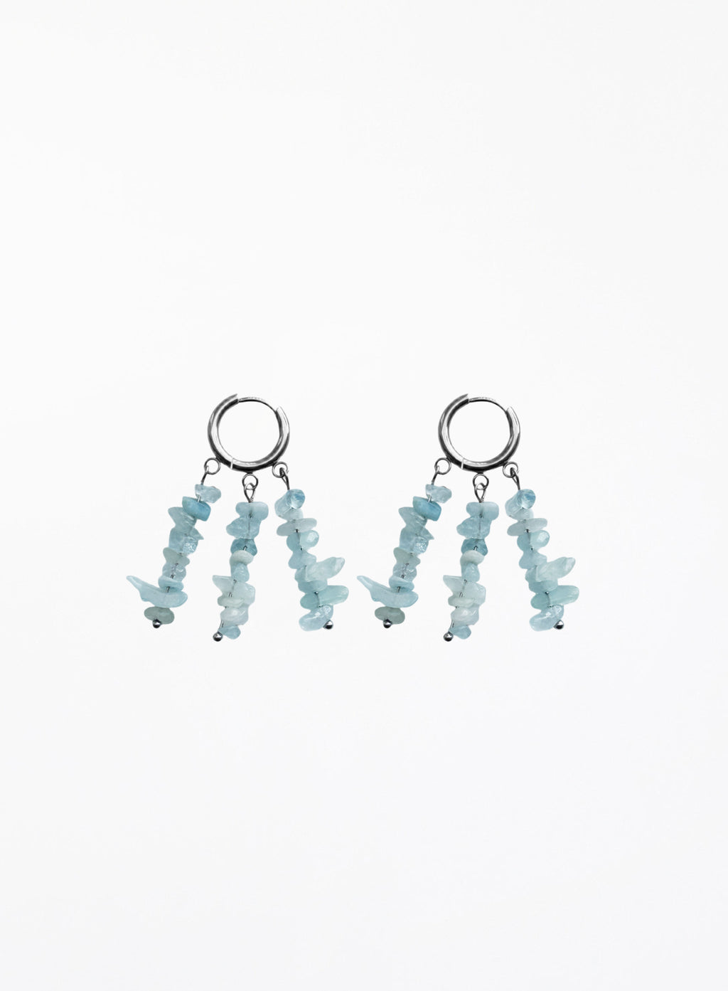 A pair of silver hoop dangle earrings with three strands of light blue chip stones hanging from each hoop, shown against a plain white background.