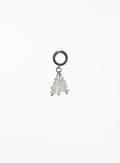 A single silver hoop earring with a dangling cluster of small clear faceted beads, photographed against a plain white background.