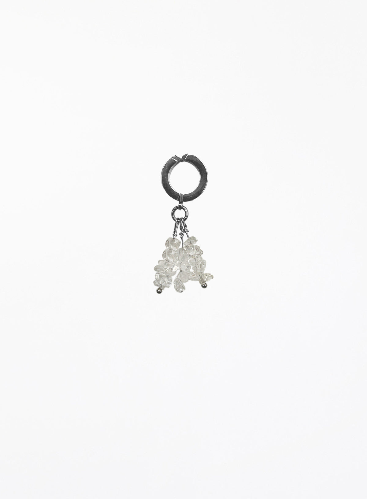 A single silver hoop earring with a dangling cluster of small clear faceted beads, photographed against a plain white background.