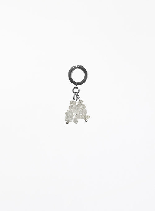 A single silver hoop earring with a dangling cluster of small clear faceted beads, photographed against a plain white background.