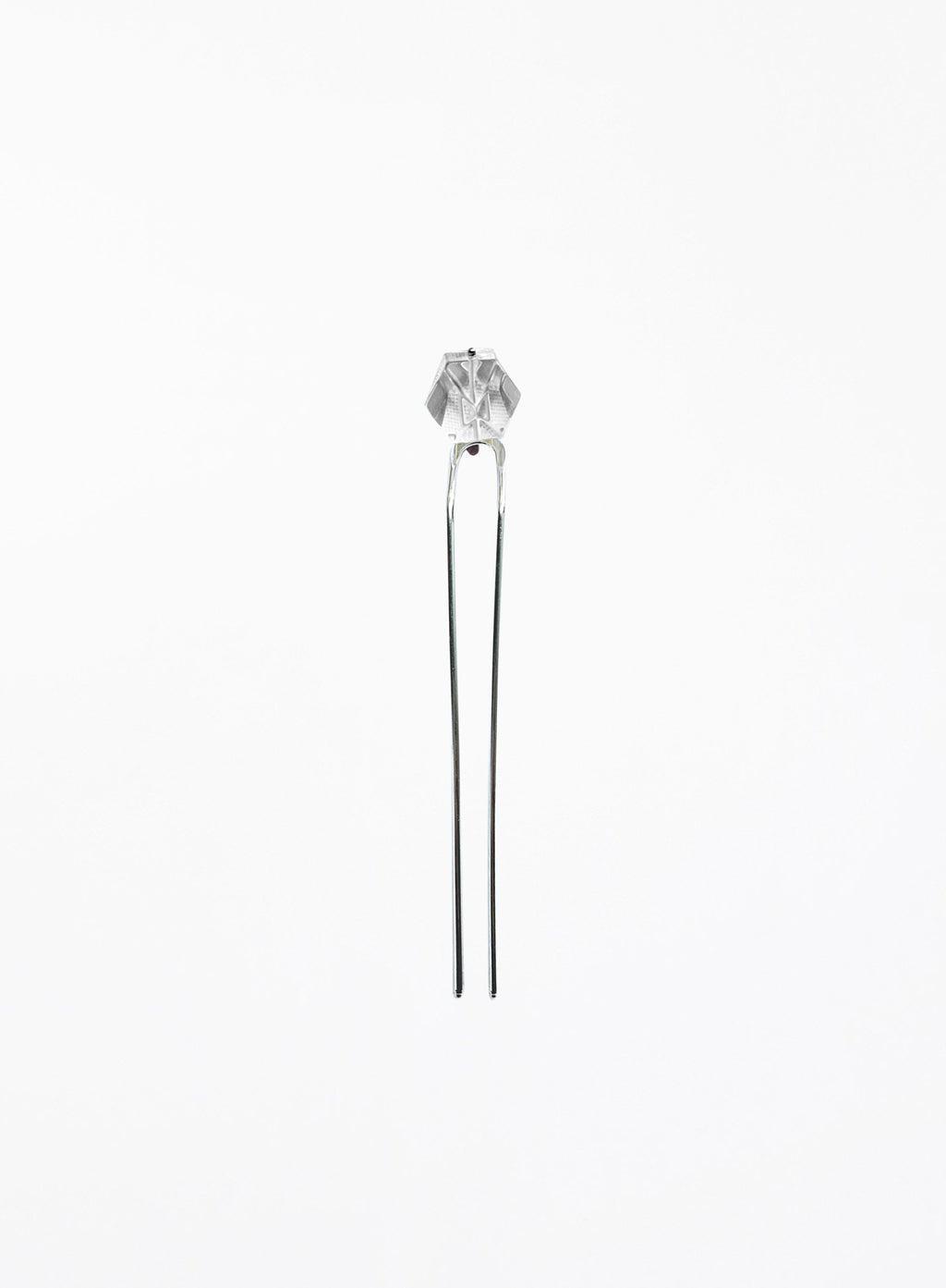 A silver-toned hair pin with a faceted clear crystal top, set against a plain white background.