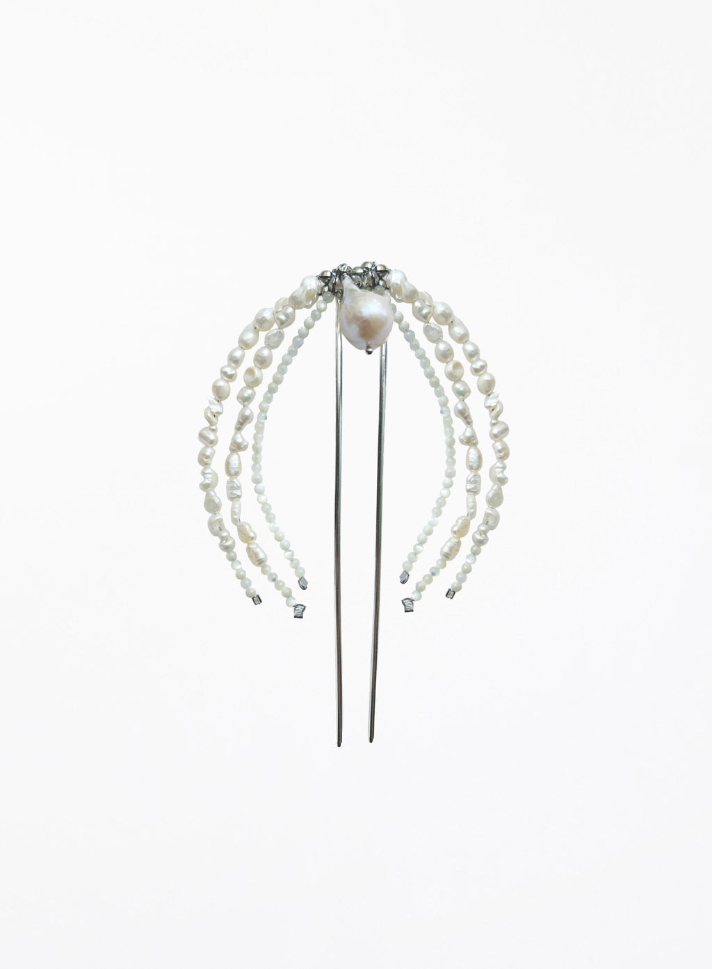A pearl hair accessory with multiple strands of white freshwater pearls draped over a silver metal hair stick, featuring a central pearl