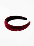 Red headband on a white background