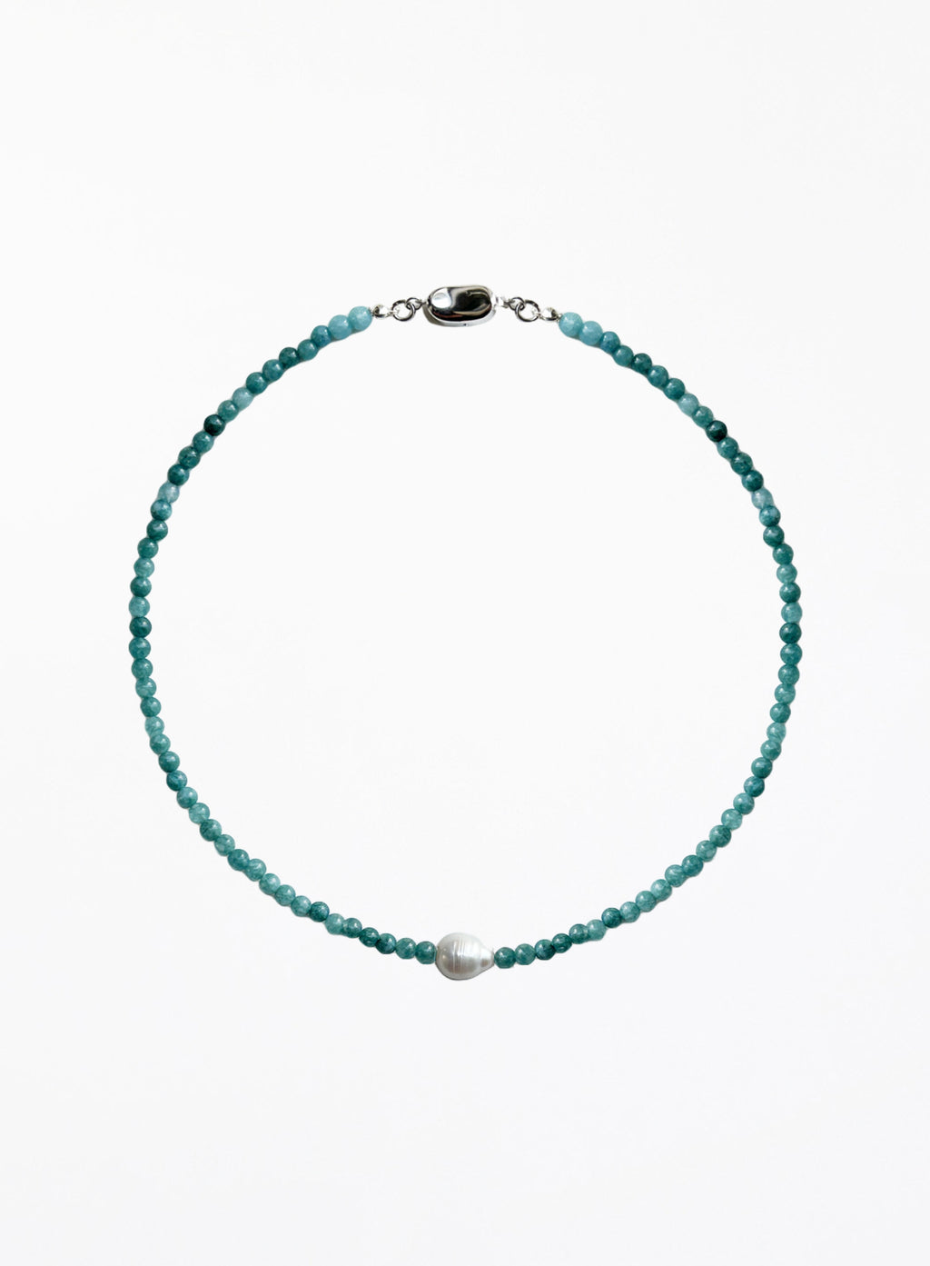 Turquoise beaded necklace with a pearl pendant on a white background
