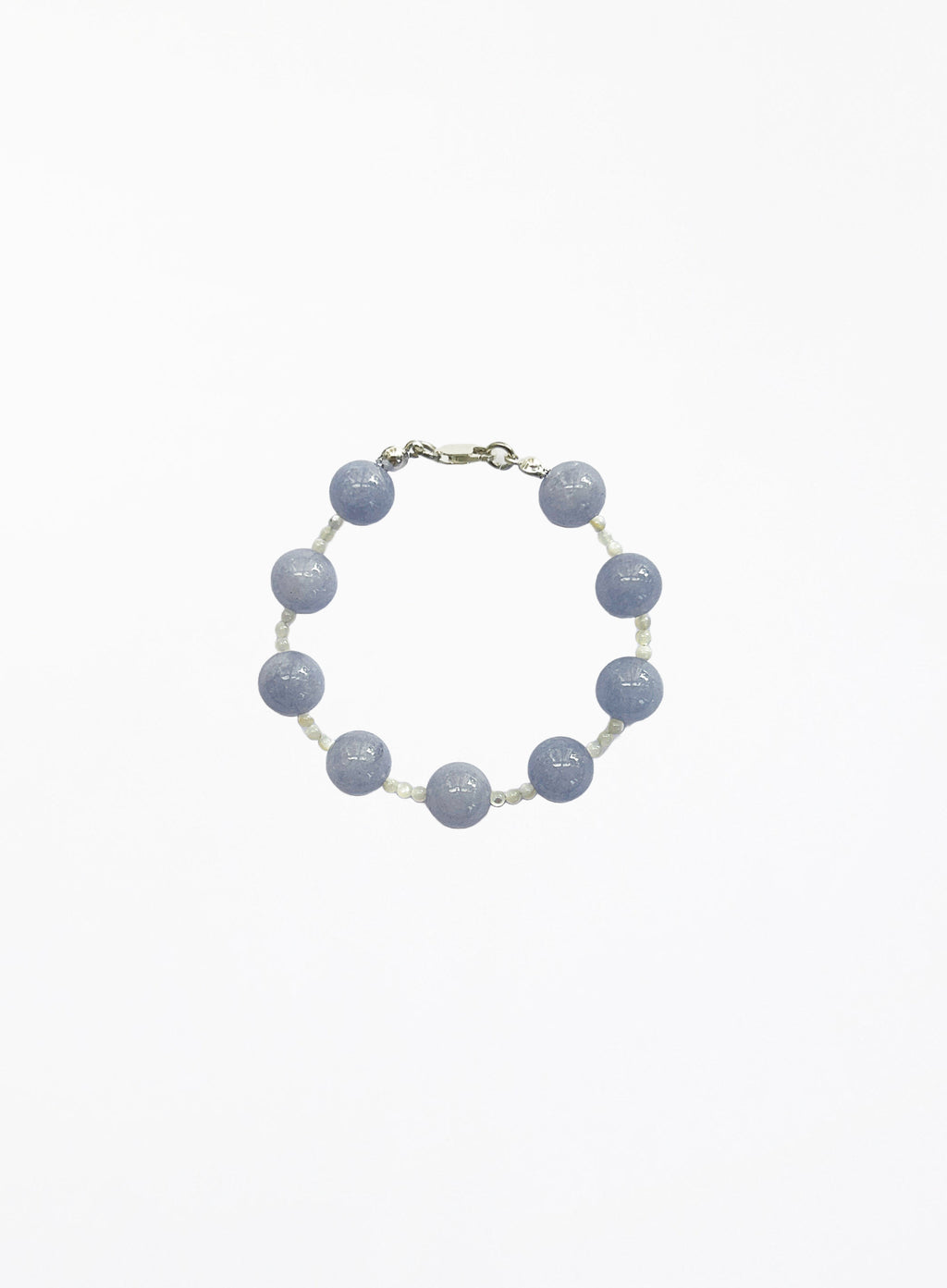 Bracelet with blue beads on a white background