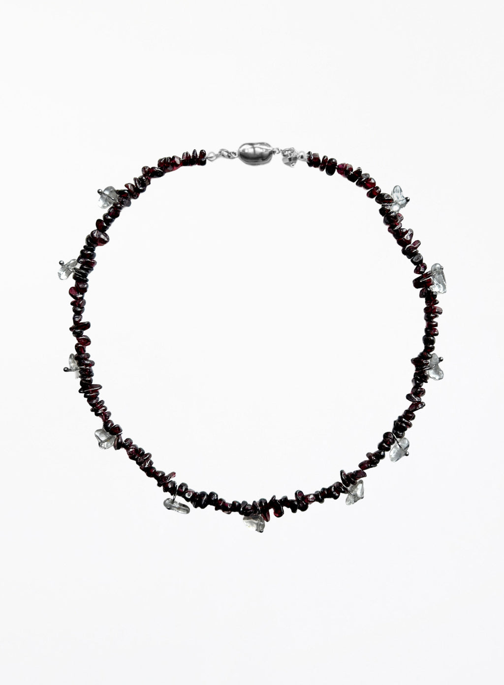 Necklace with red beads and silver accents on a white background