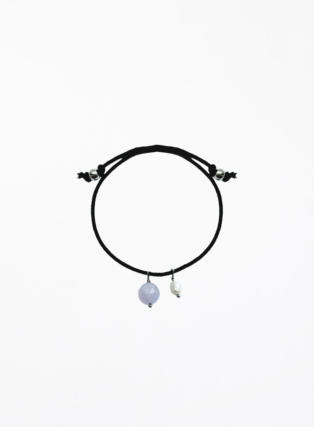 black cord bracelet with blue stone charm and pearl charm