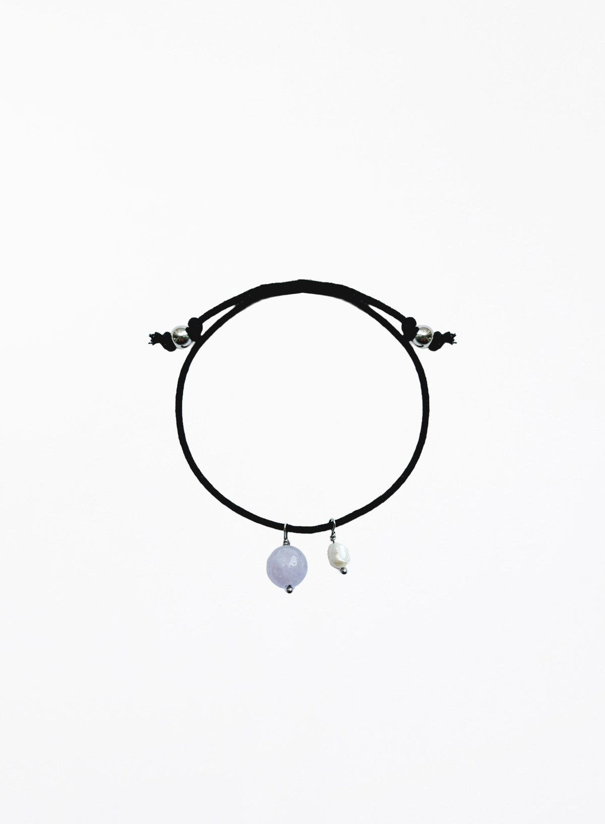black cord bracelet with blue stone charm and pearl charm
