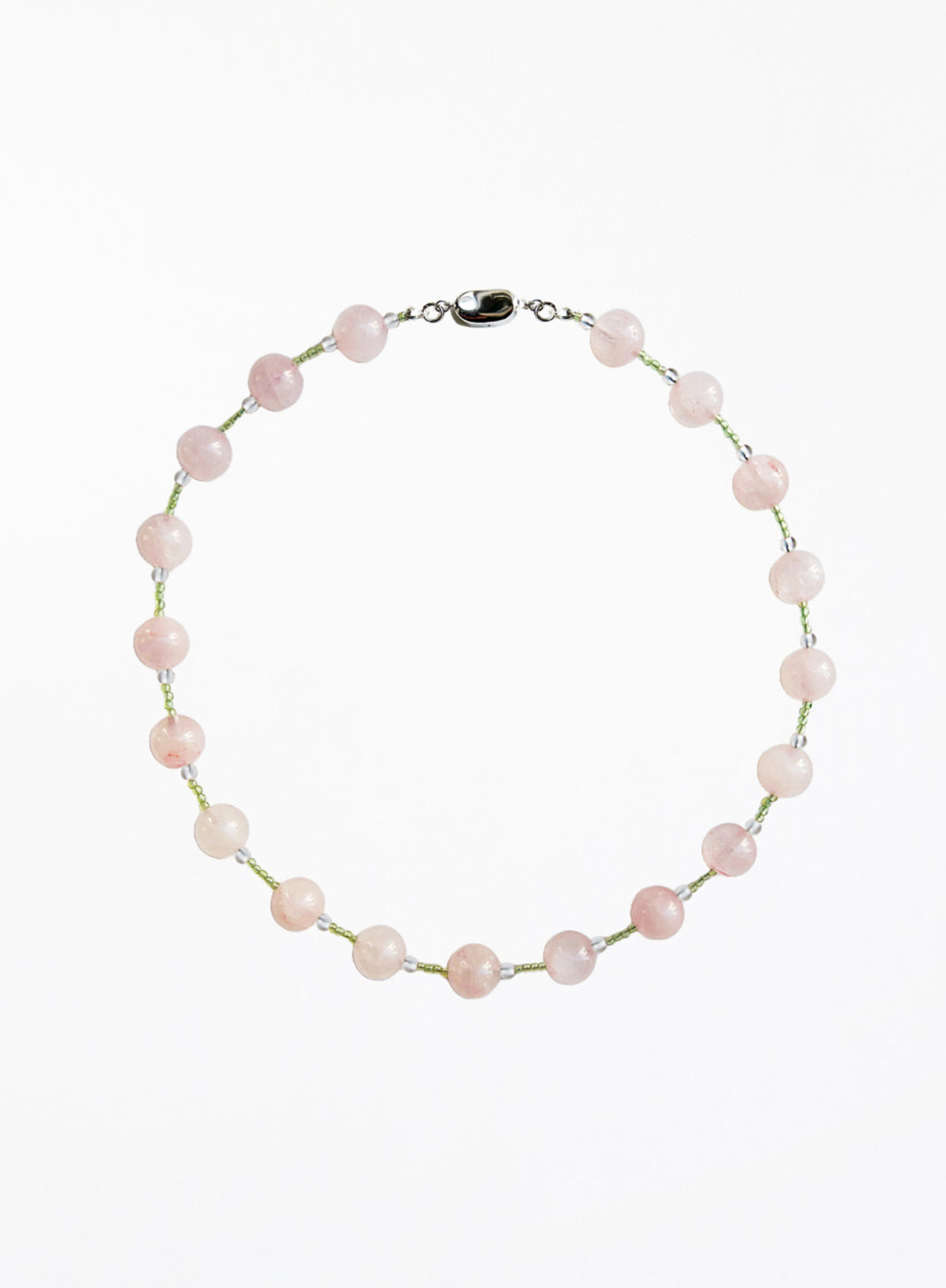 Necklace with pink and green beads beads on a white background