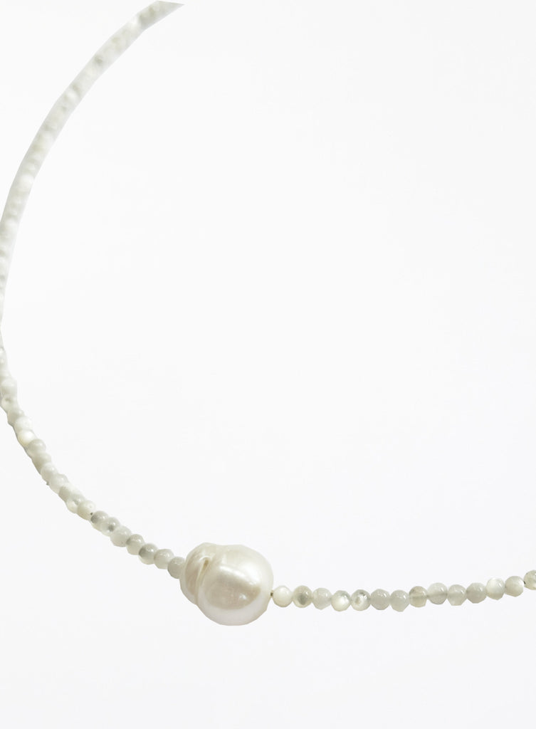 Pearl necklace on a white background