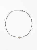 Pearl necklace on a white background