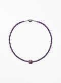 Purple amethyst necklace with square pendant on a white background