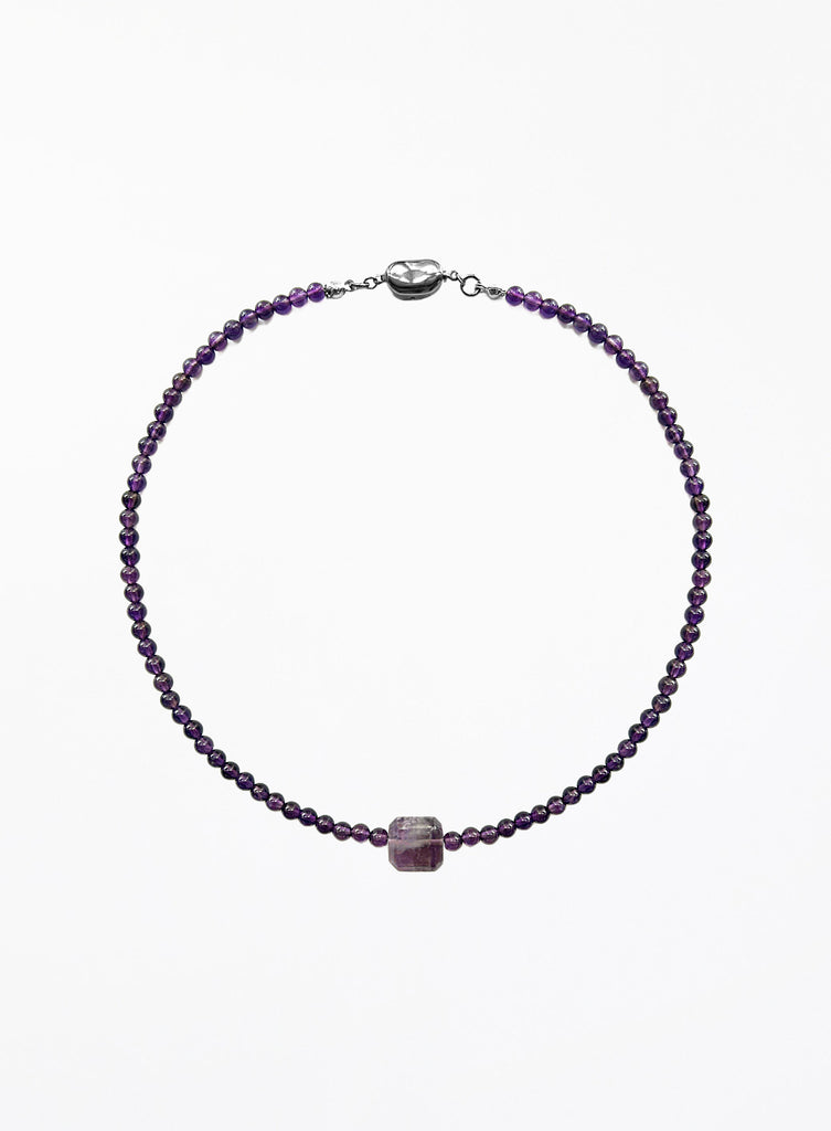 Purple amethyst necklace with square pendant on a white background