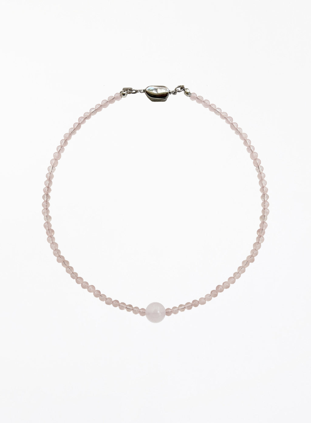 pink necklace on a white background