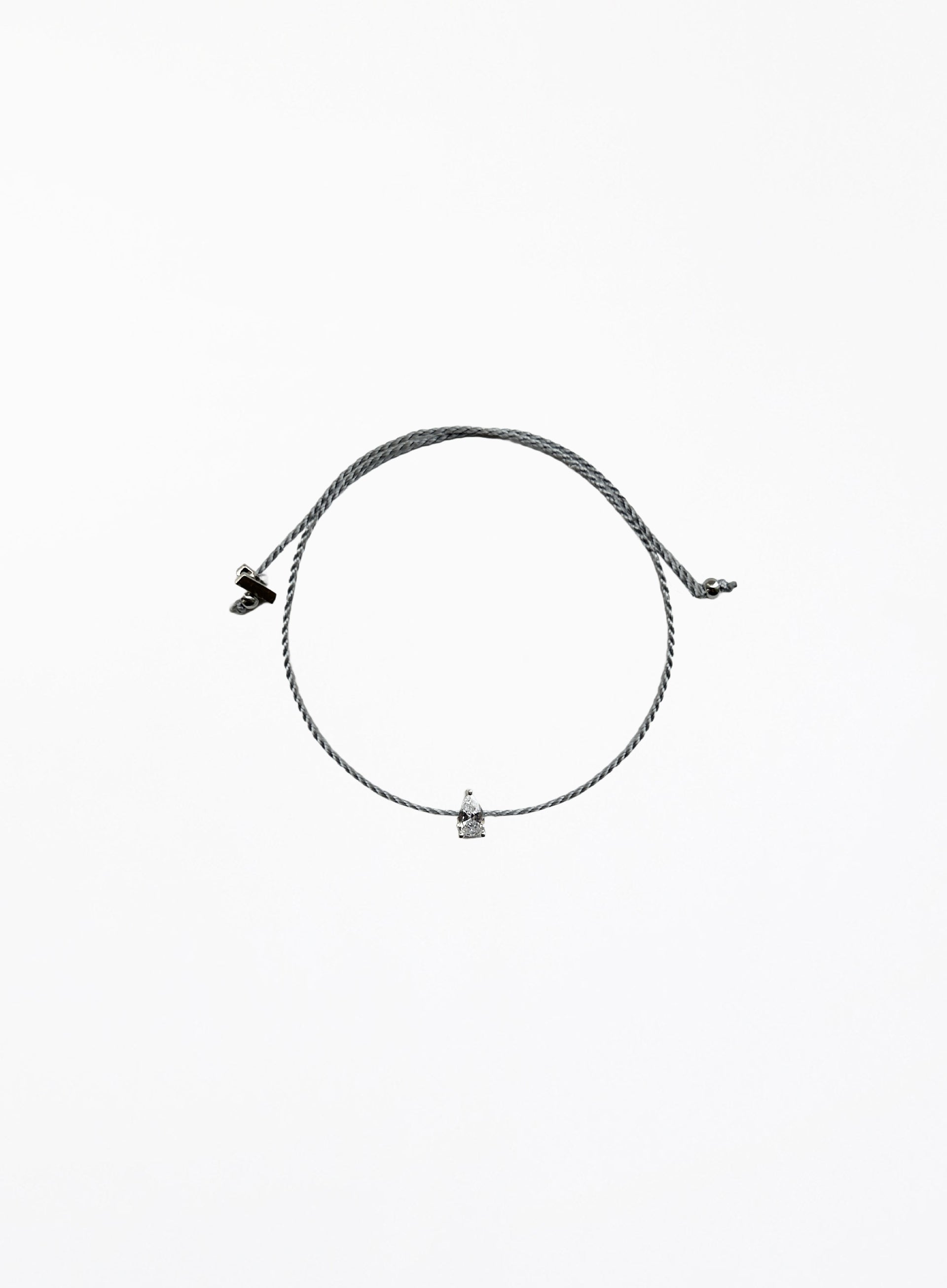 grey silk cord bracelet with teardrop cubic zirconia charm