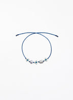 blue silk cord bracelet with eveil eye beads and pearls