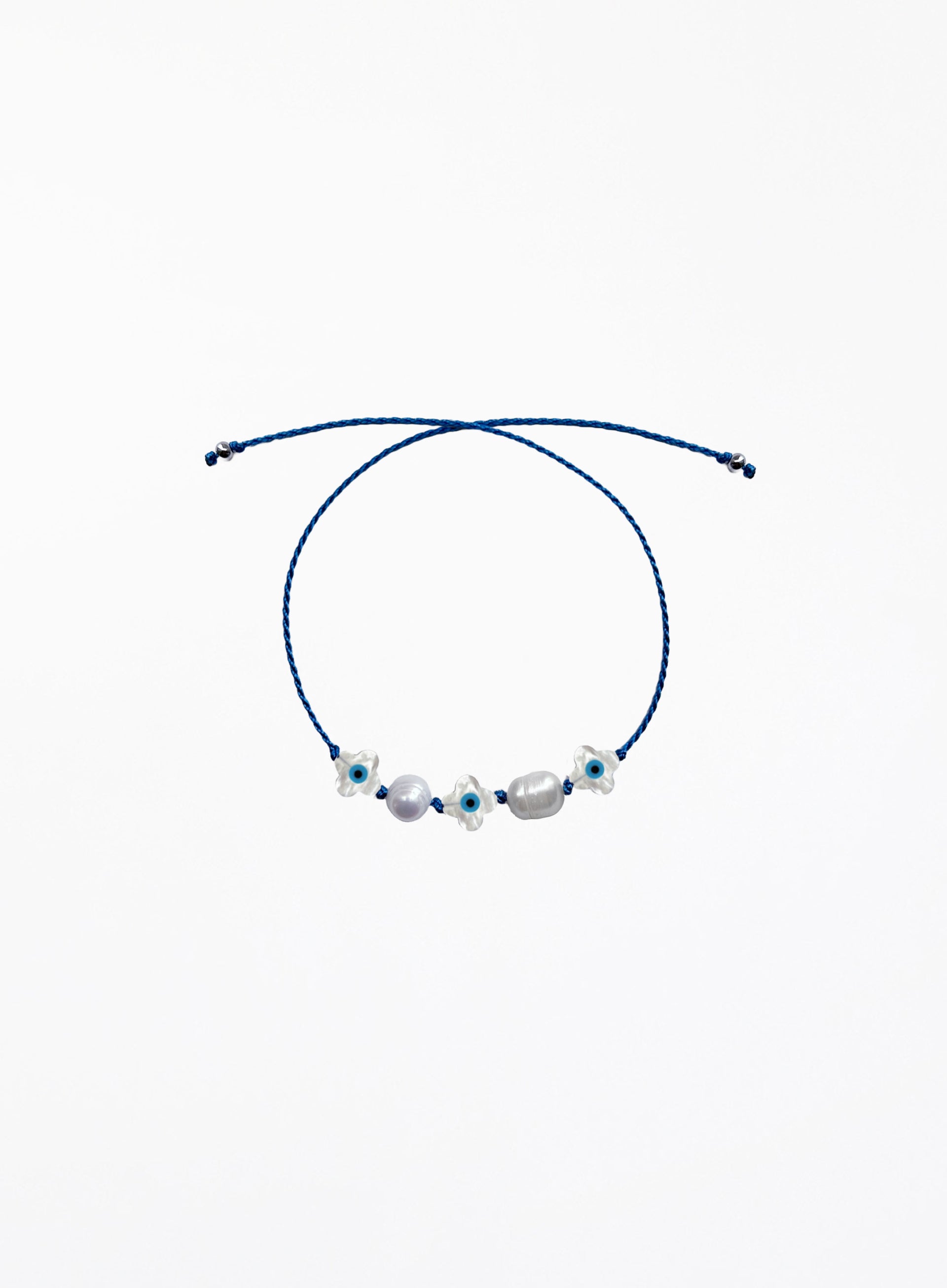 blue silk cord bracelet with eveil eye beads and pearls