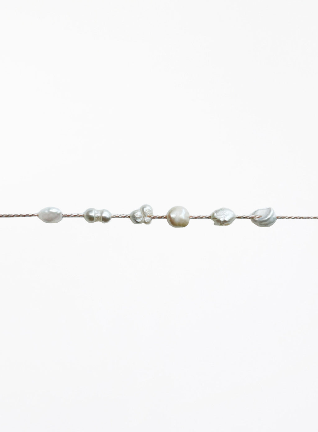 Pearl bracelet on a white background