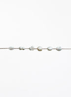 Pearl bracelet on a white background
