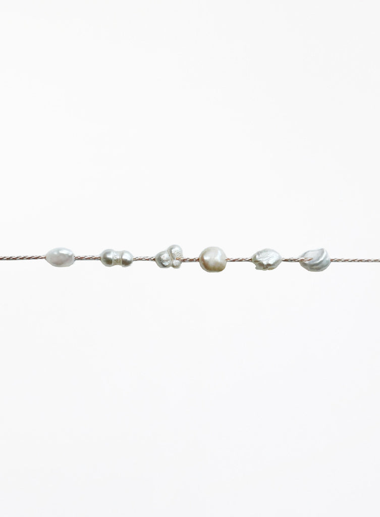 Pearl bracelet on a white background