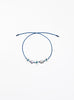 blue silk cord bracelet with eveil eye beads and pearls