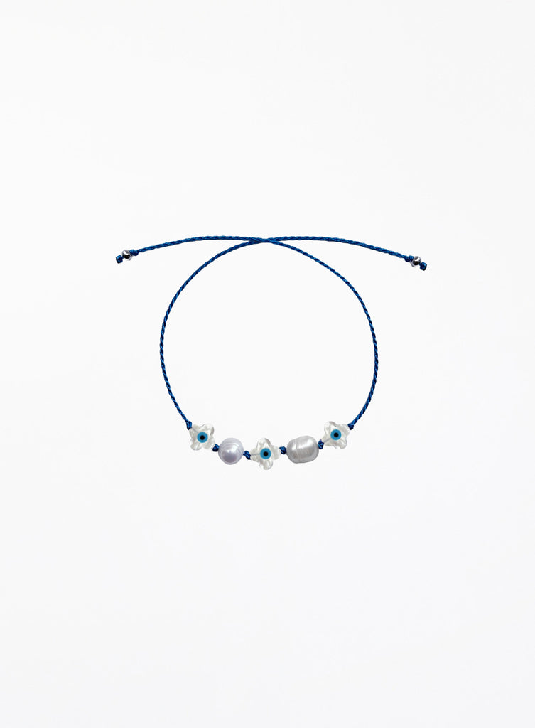 blue silk cord bracelet with eveil eye beads and pearls