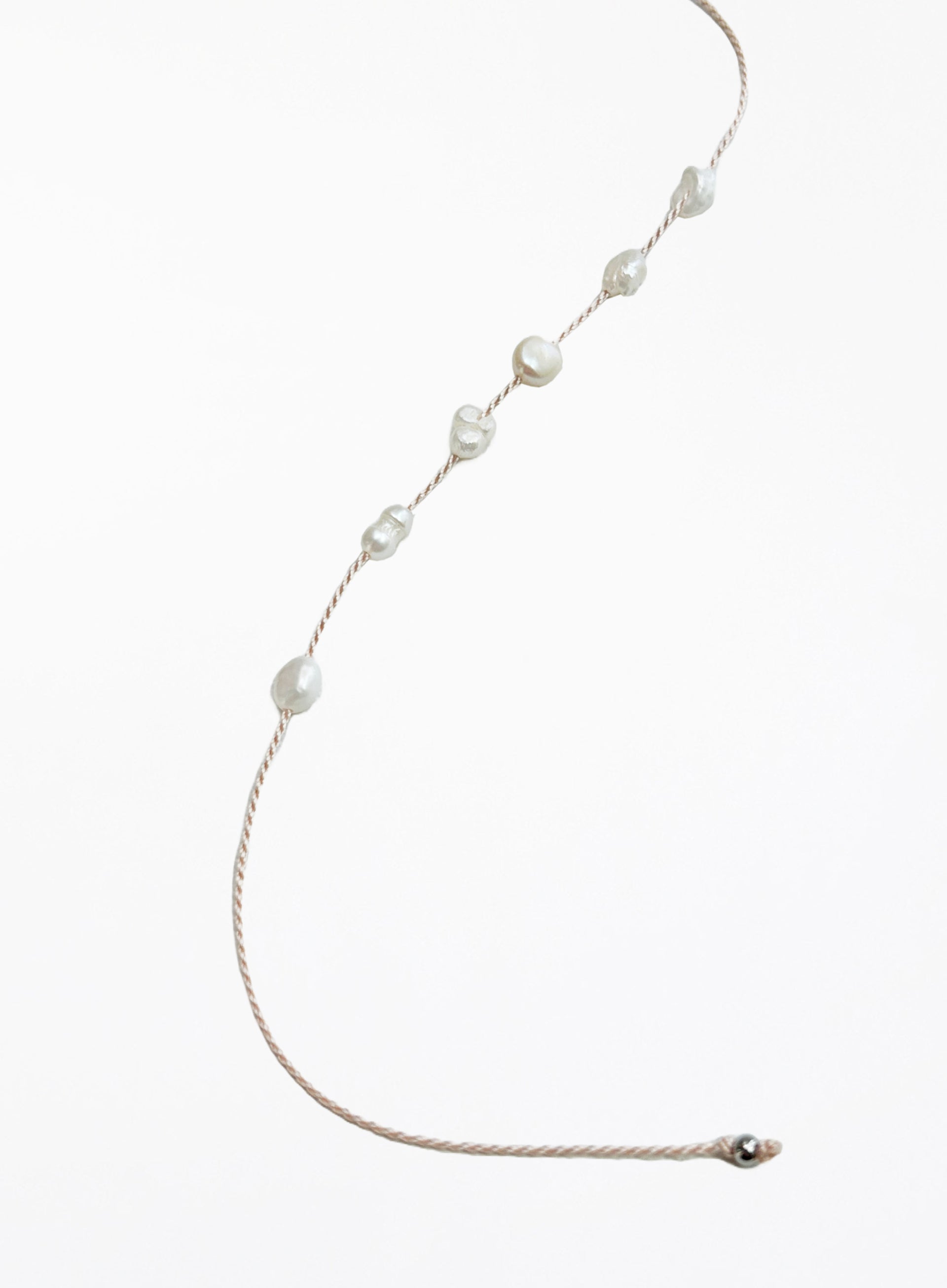 Pearl bracelet on a white background