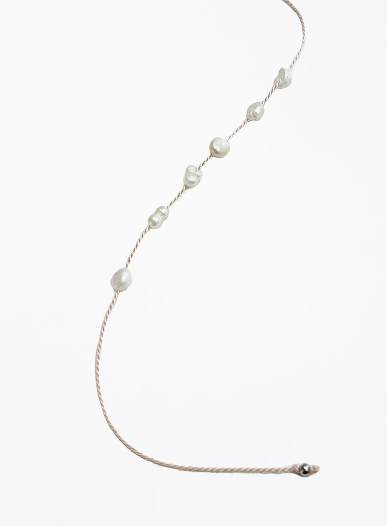 Pearl bracelet on a white background