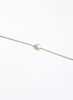 rose pink cord bracelet with pearl charm