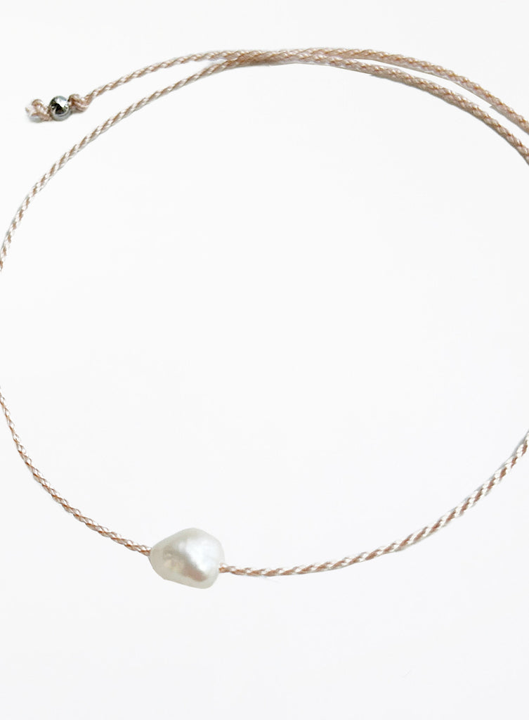 rose pink cord bracelet with pearl charm