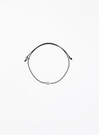 black bracelet with single pearl charm