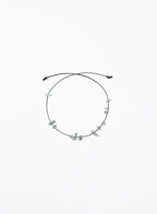 labradorite stones silk cord bracelet on white background