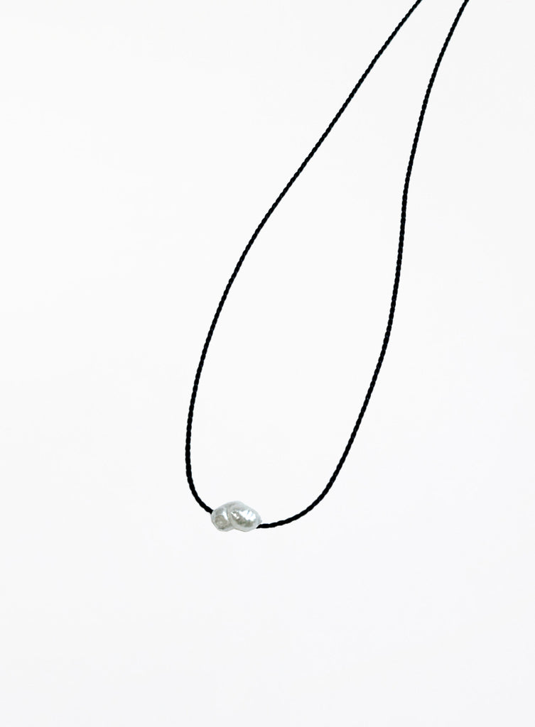 black bracelet with single pearl charm