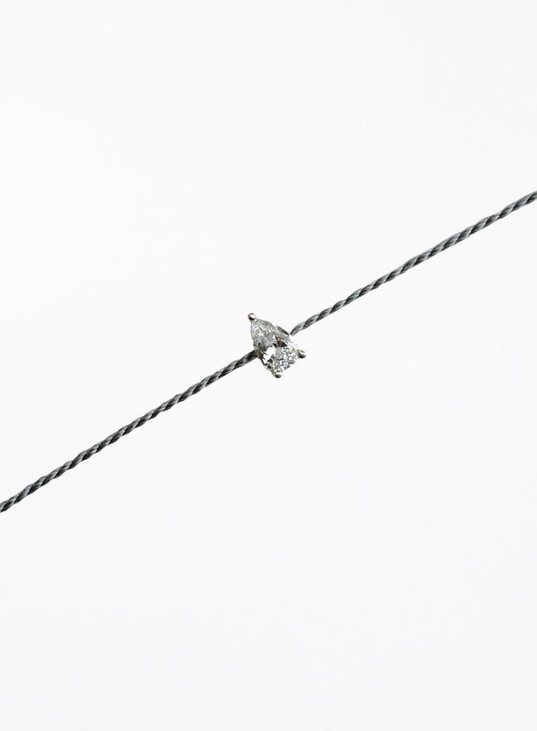 grey silk cord bracelet with teardrop cubic zirconia charm