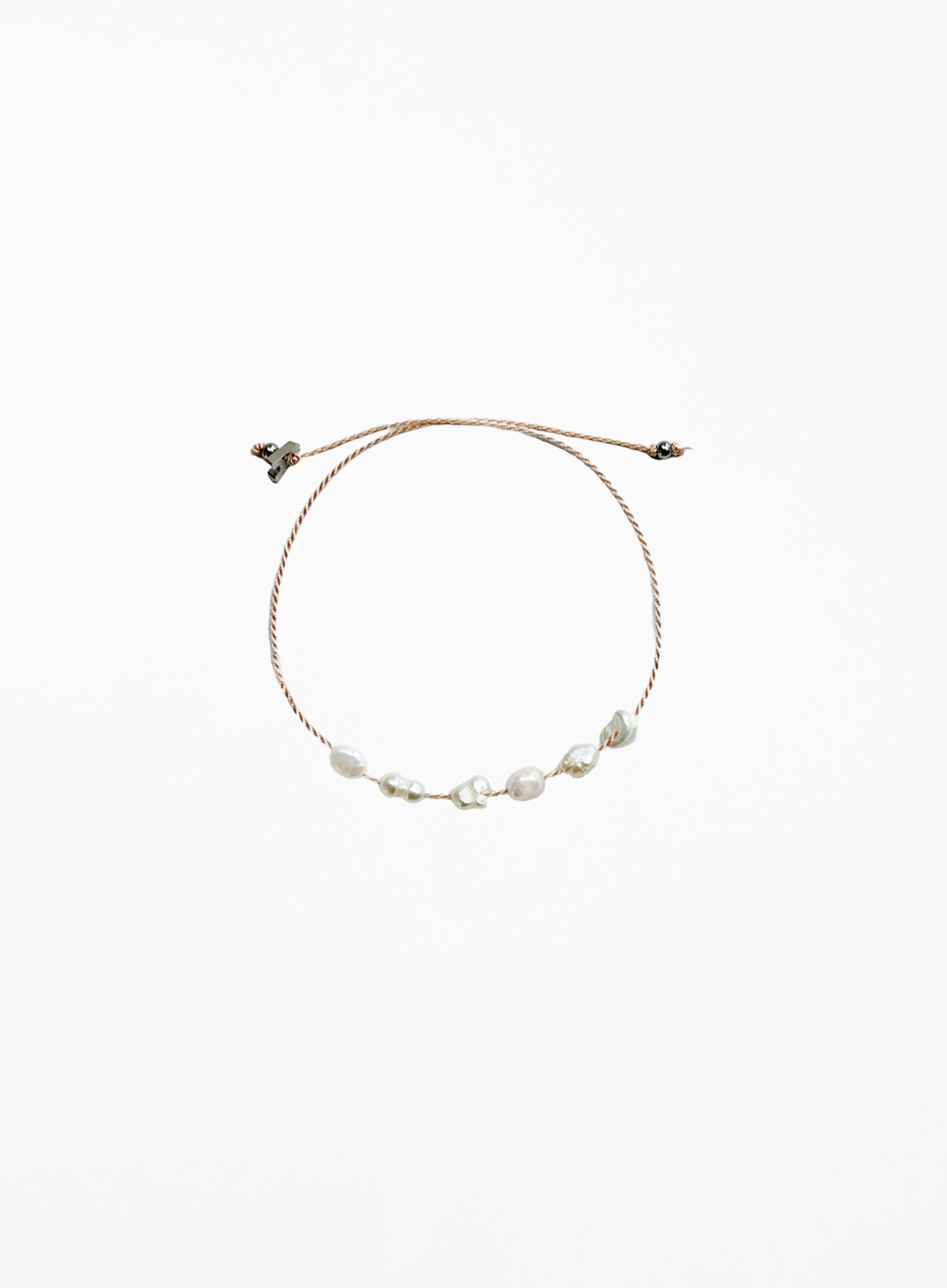Pearl bracelet on a white background