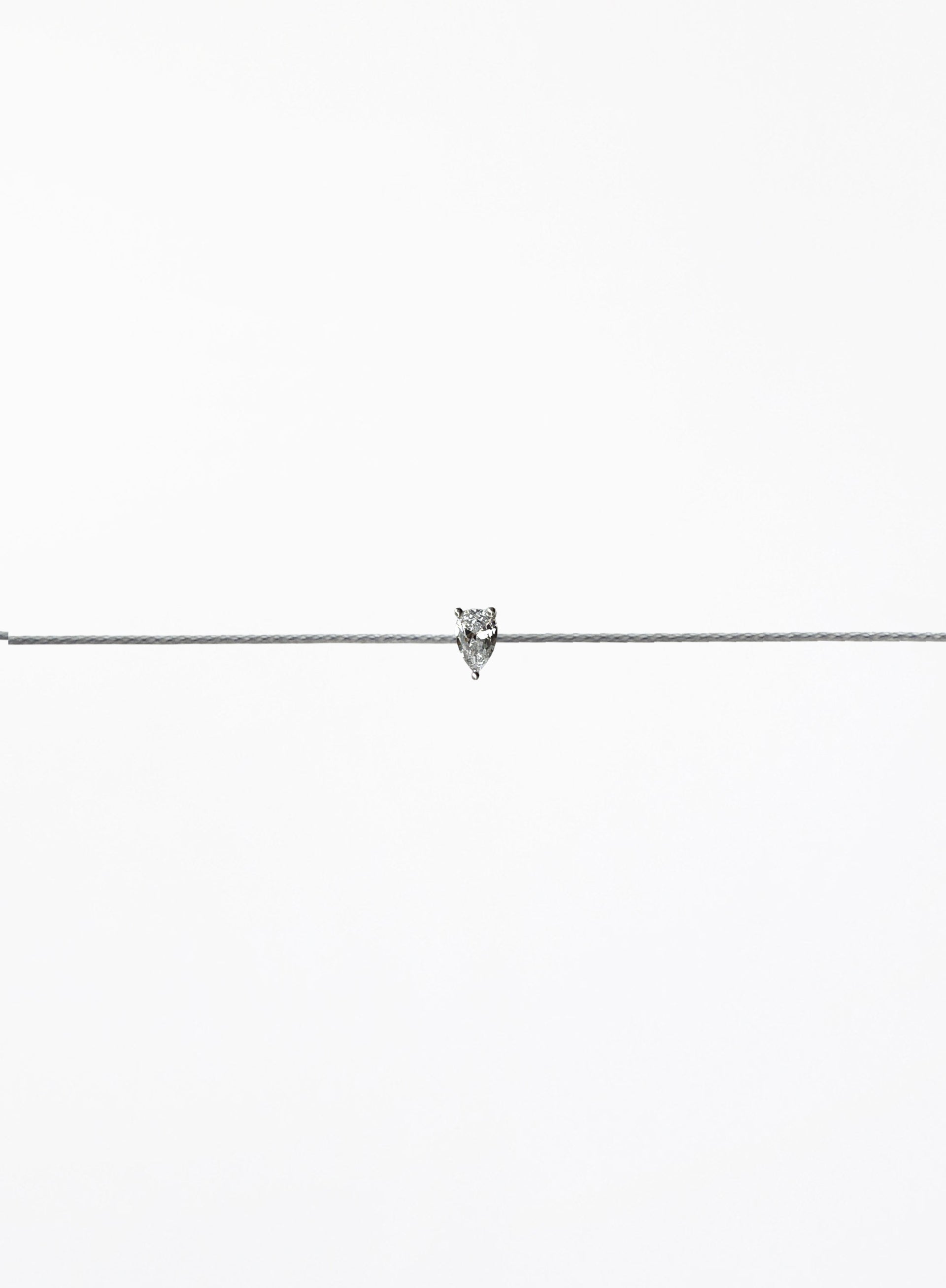 grey silk cord bracelet with teardrop cubic zirconia charm