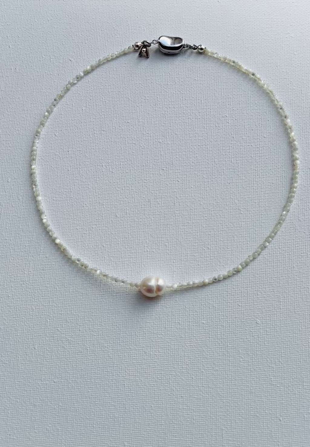 shell necklace with solo pearl
