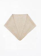 Beige triangular wool scarf on a white background