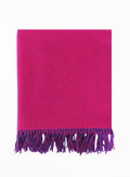 Pink shawl with purple fringe on a white background
