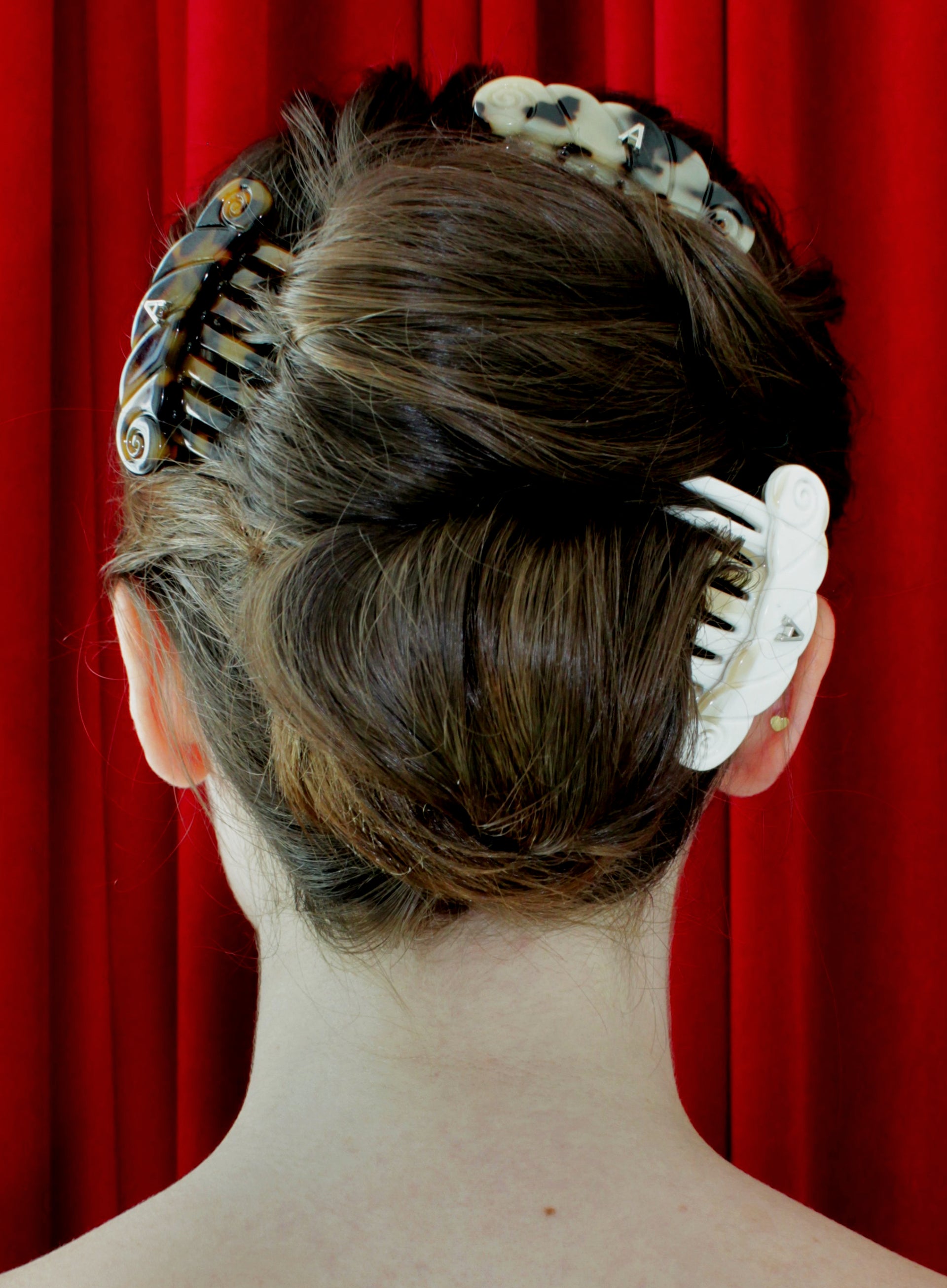 woman wearing multiple hairclaws