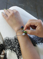 woman multiple silk cord beaded bracelets
